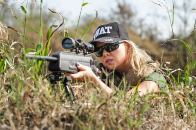 bigstock Female Army Soldier Shooting W 408954839